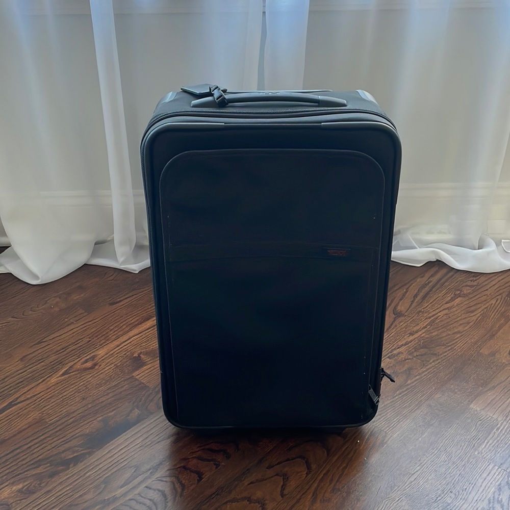 Tumi carry on bag. Barely used. Two wheels.
